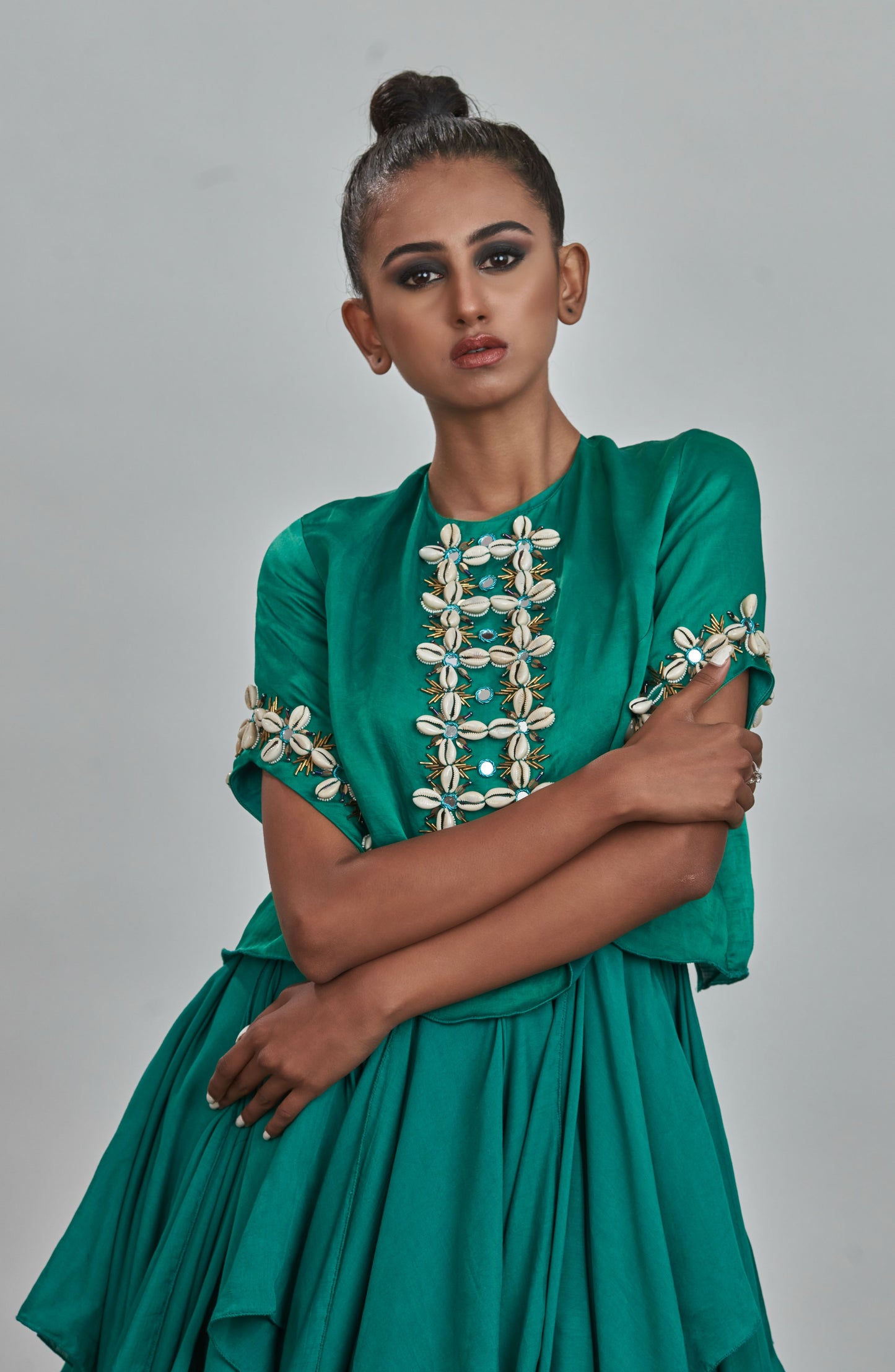 Green kodi embroidered blouse with ruffled gown