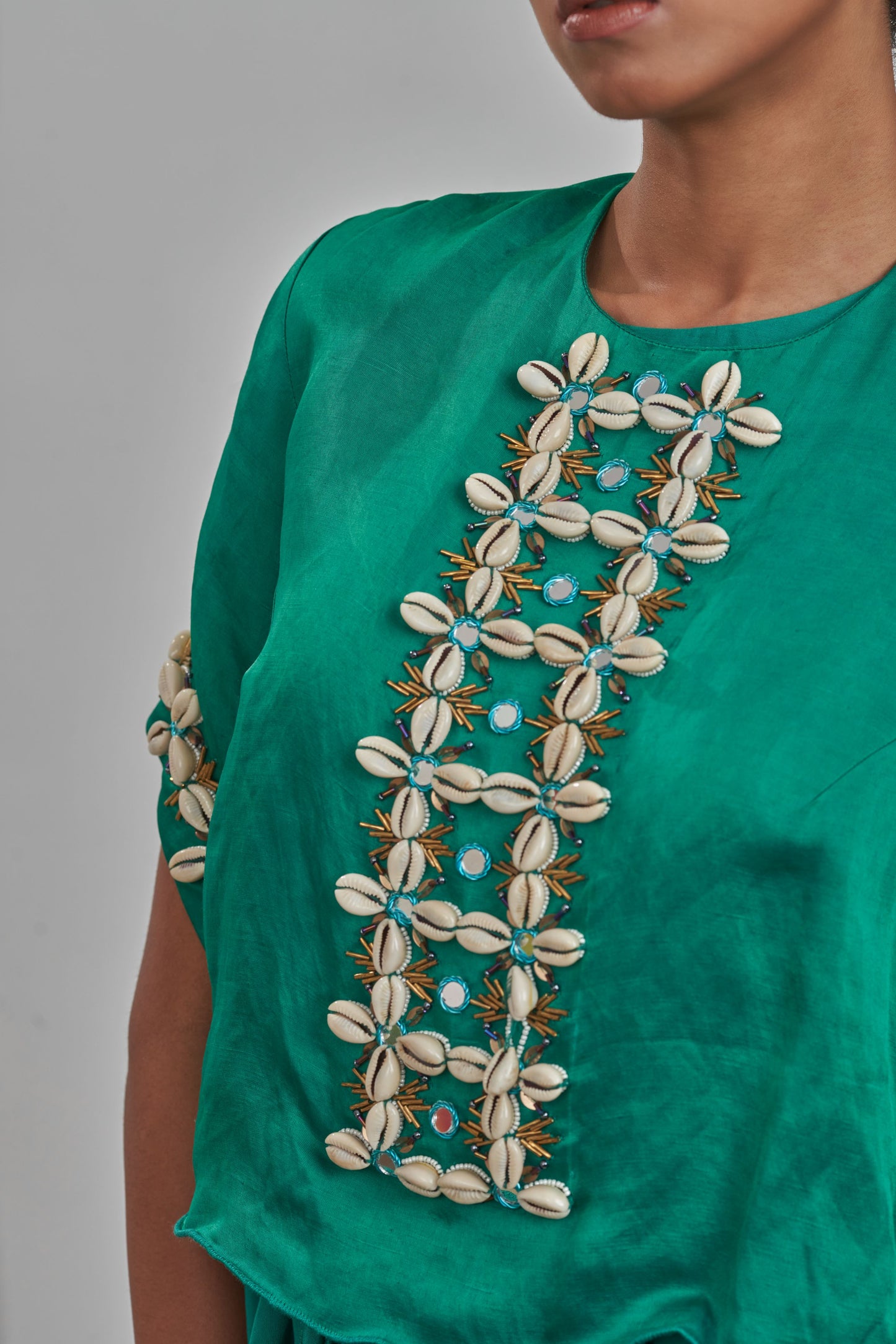 Green kodi embroidered blouse with ruffled gown