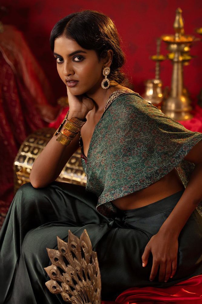 
                  
                    Emerald green Print Blocked Draped Saree
                  
                