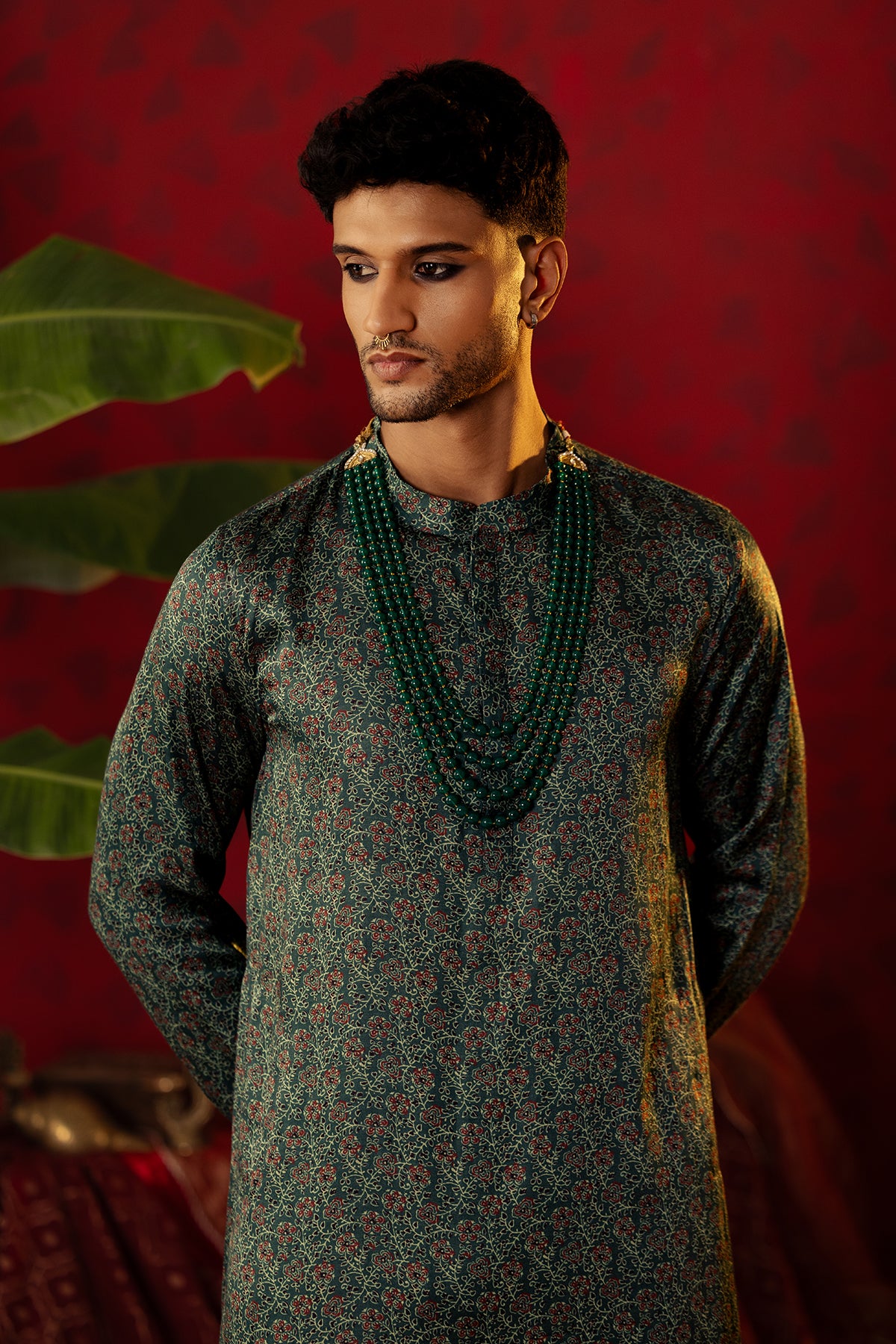 
                  
                    "Emerald Eclipse' Green Ajrakh Dhoti Kurta Set
                  
                