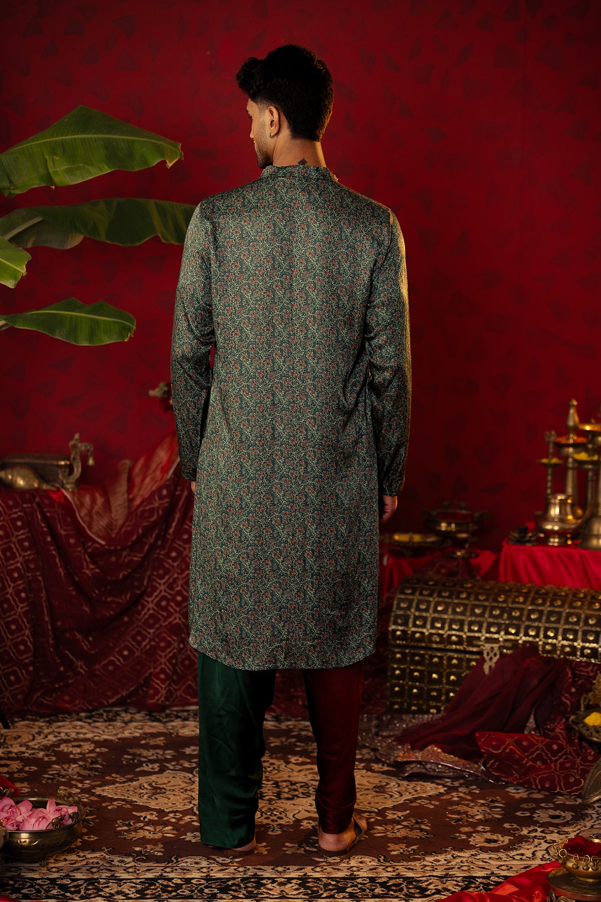 
                  
                    "Emerald Eclipse' Green Ajrakh Dhoti Kurta Set
                  
                