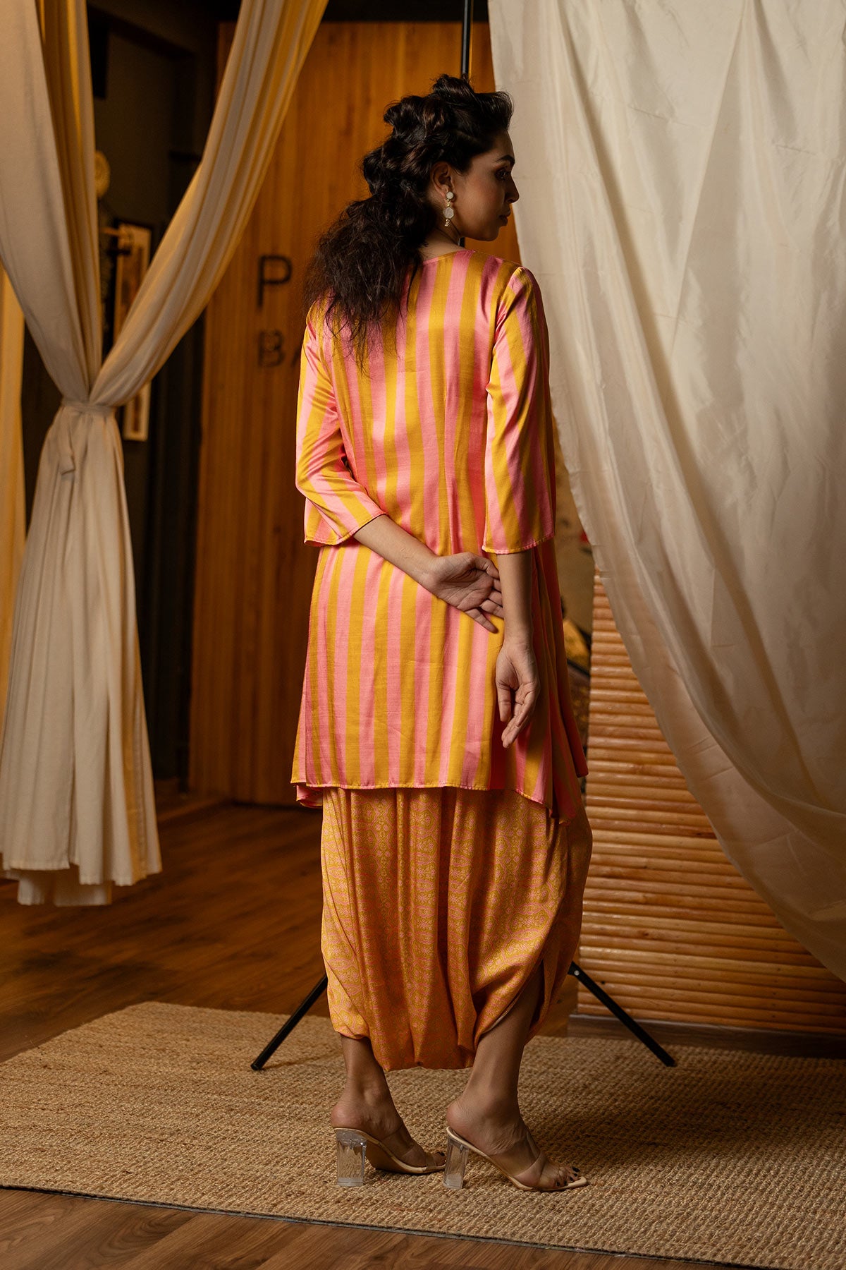 
                  
                    Pink & gold  Striped Kurta Dhoti Set
                  
                