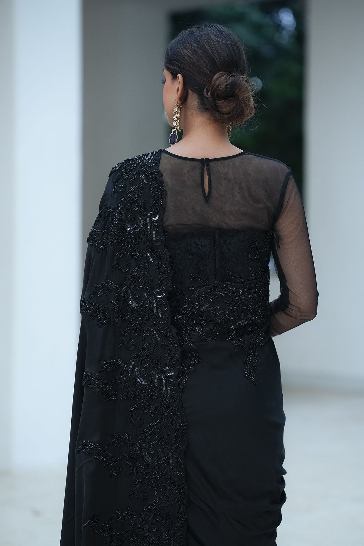 
                  
                    Black Satin Beaded Border Split Saree
                  
                