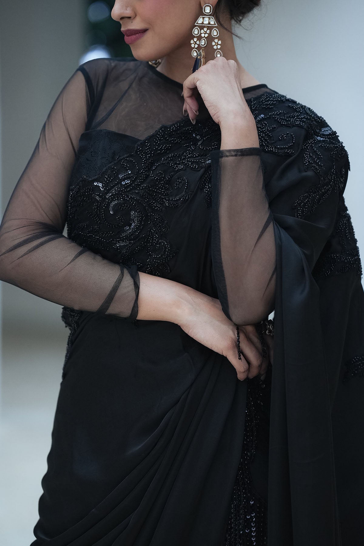 
                  
                    Black Satin Beaded Border Split Saree
                  
                