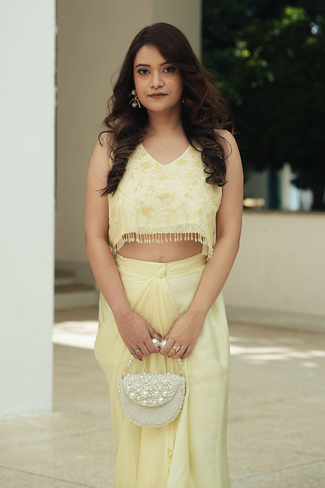 
                  
                    Pastel Yellow Monotone Draped Skirt Set
                  
                