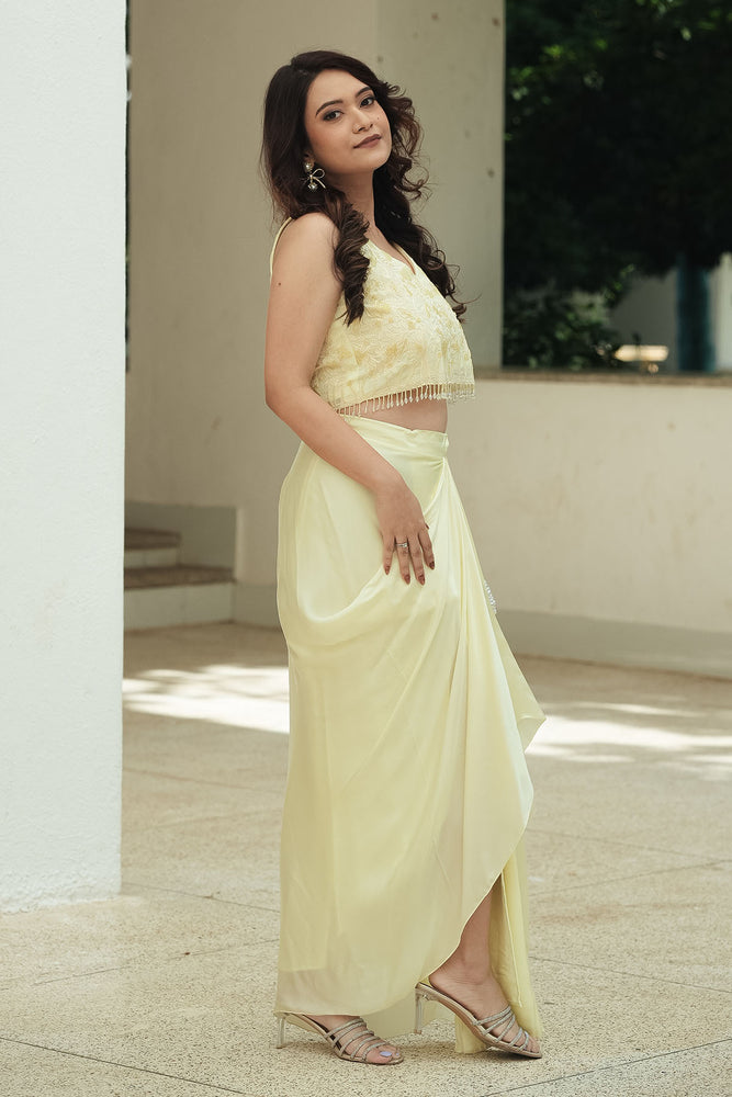 
                  
                    Pastel Yellow Monotone Draped Skirt Set
                  
                