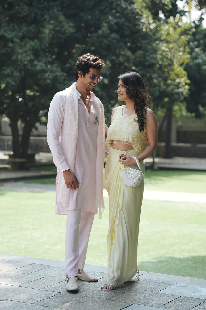 
                  
                    Pastel Yellow Monotone Draped Skirt Set
                  
                