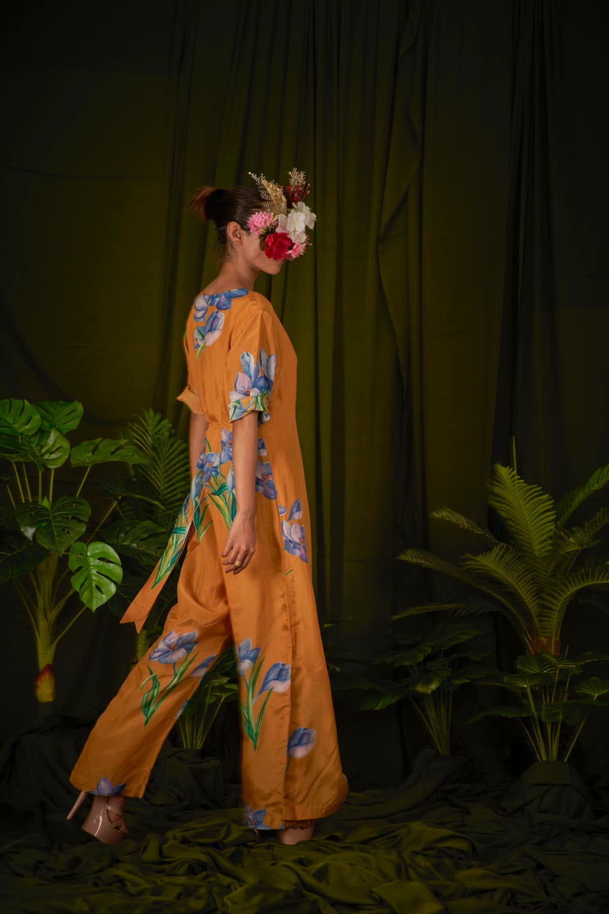 
                  
                    Wildsaffron Flower Overlay Jumpsuit.
                  
                