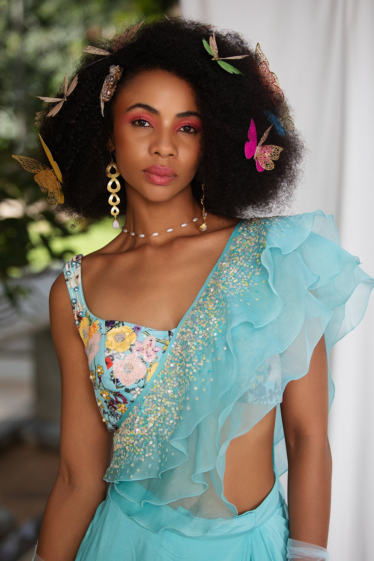 
                  
                    Botanical floral embroidered blouse and draped skirt
                  
                