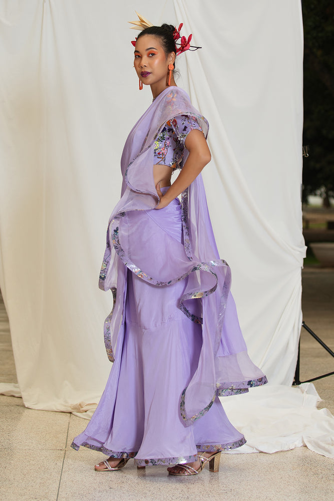 
                  
                    Lavender ruffled skirt saree with blouse
                  
                