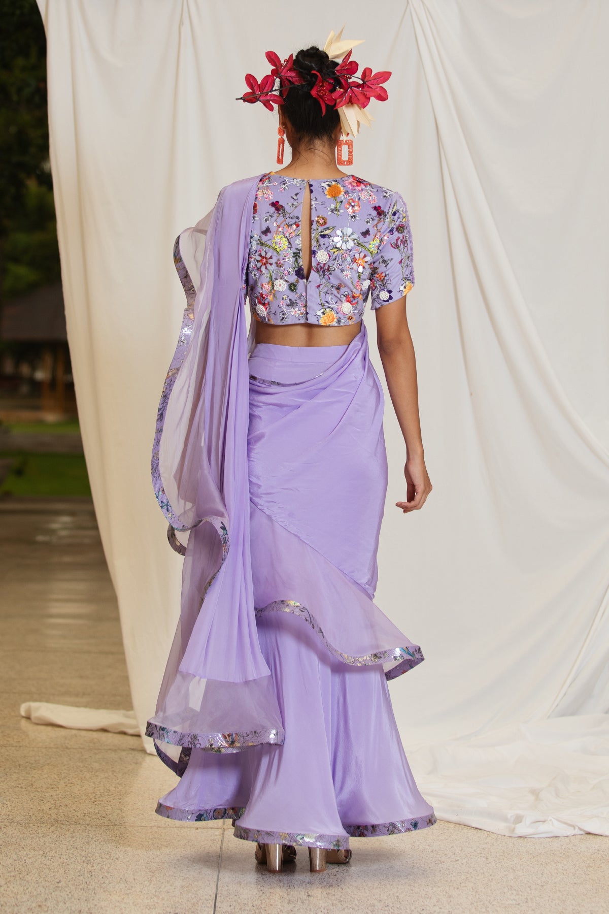 
                  
                    Lavender ruffled skirt saree with blouse
                  
                