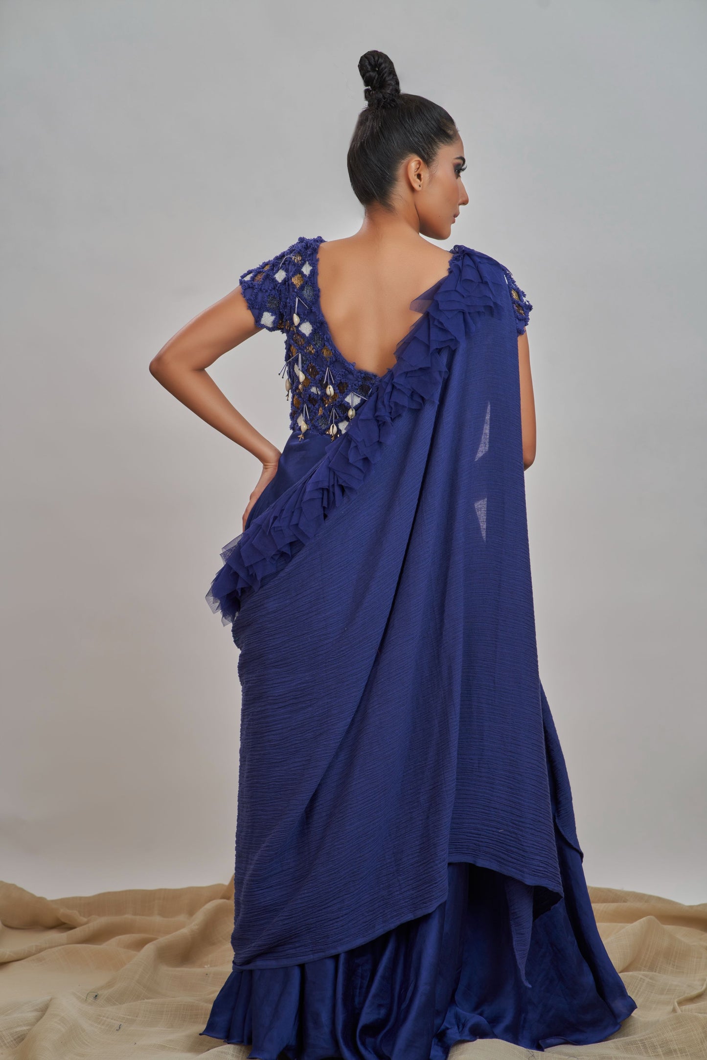 
                  
                    Blue candle work gown with shash
                  
                