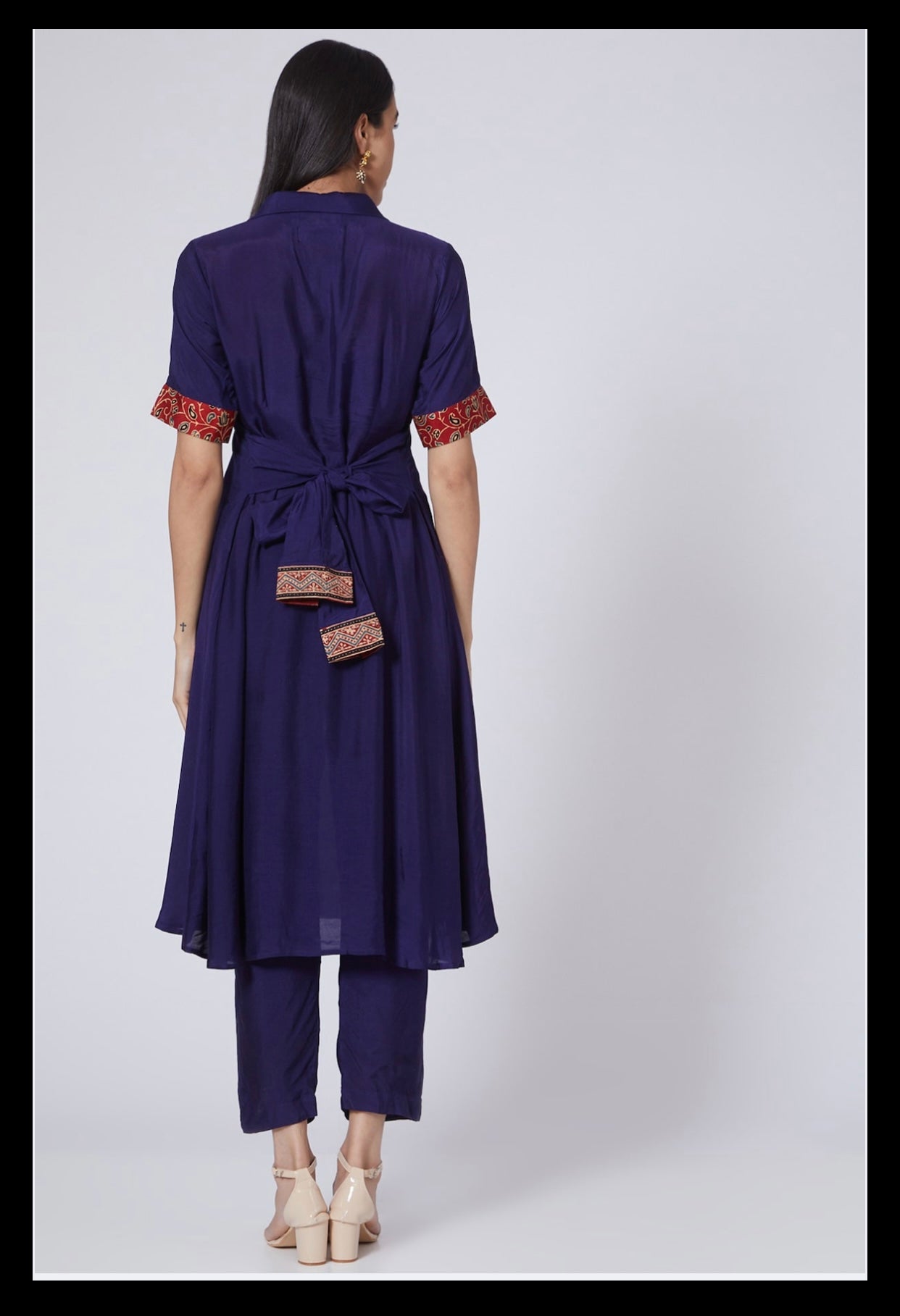 
                  
                    Front Tie Shirt Tunic Styled With Shibori Ajrakh Dupatta And Straight Pant.
                  
                