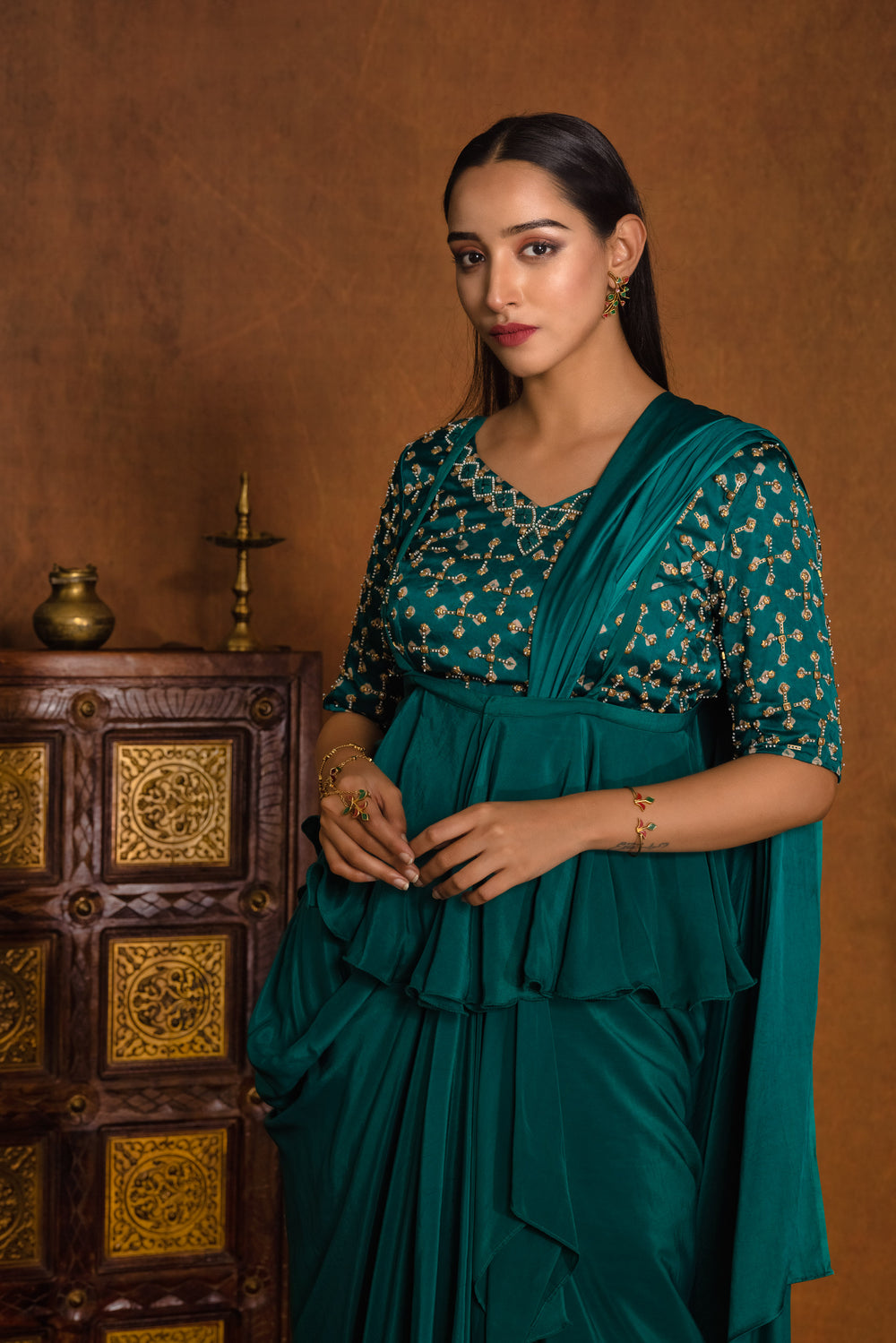 Bandhani embroidered blouse with draped wrap saree styled with suspender peplum