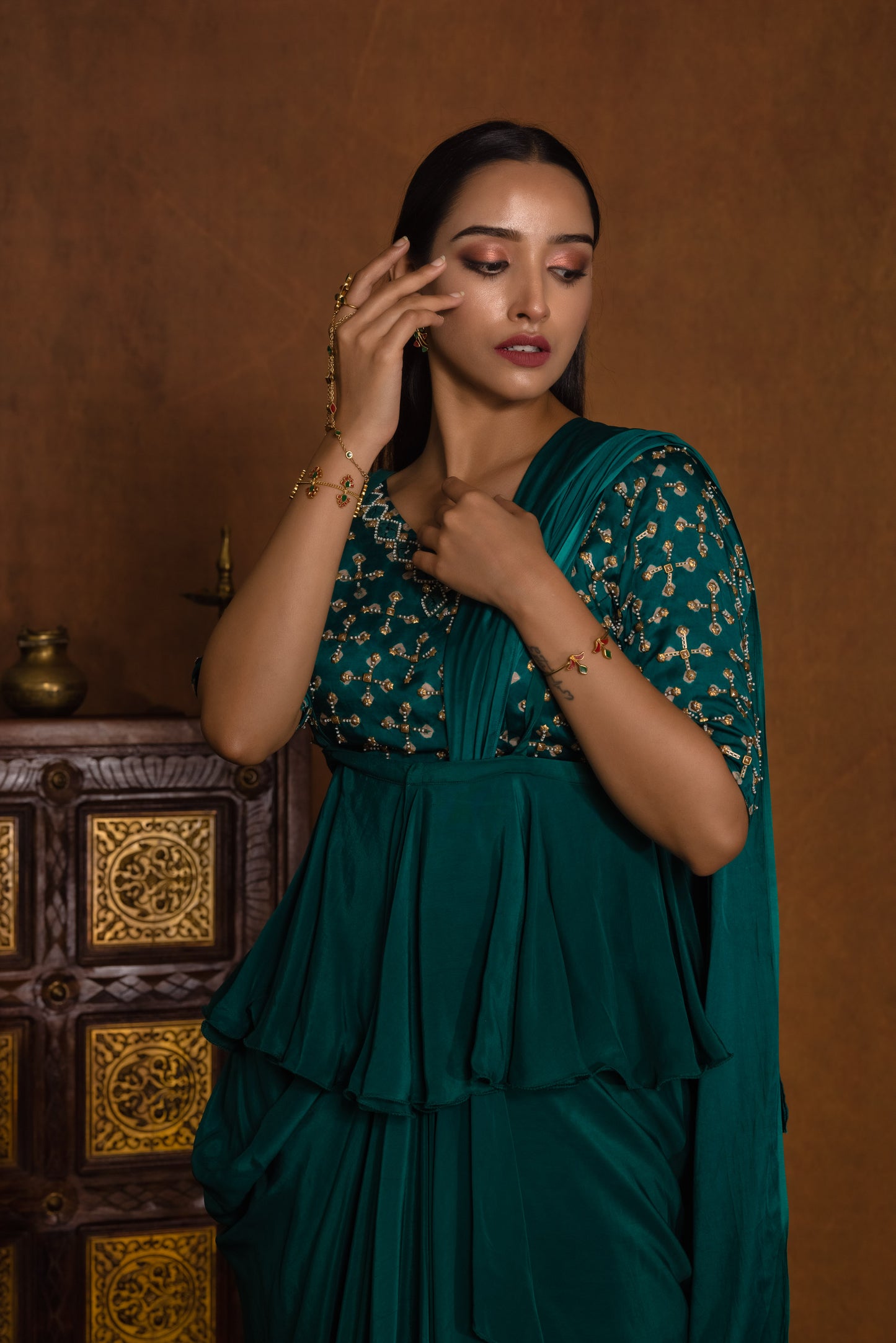 
                  
                    Bandhani embroidered blouse with draped wrap saree styled with suspender peplum
                  
                