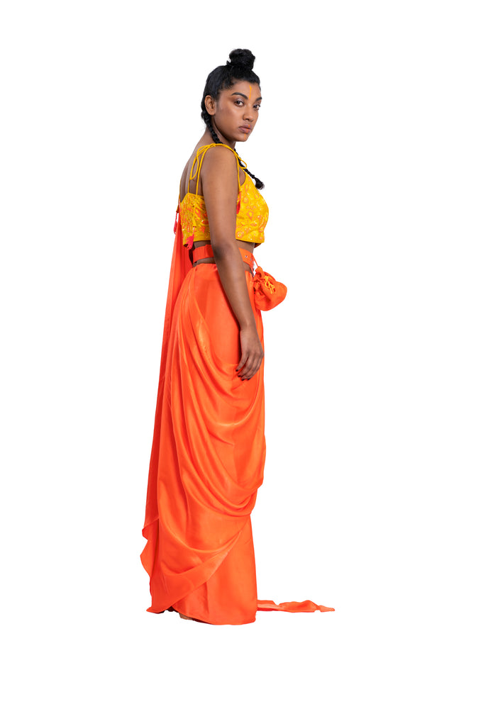 
                  
                    Pure Satin Neon Orange Saree Styled With Neon Embroidered Sequin Blouse.
                  
                