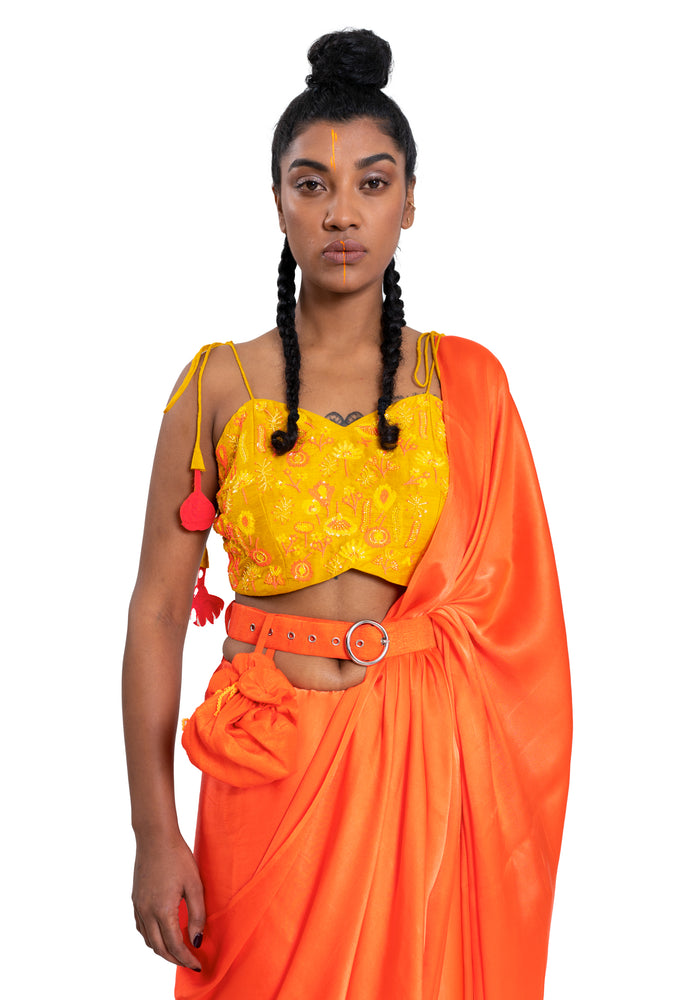 
                  
                    Pure Satin Neon Orange Saree Styled With Neon Embroidered Sequin Blouse.
                  
                
