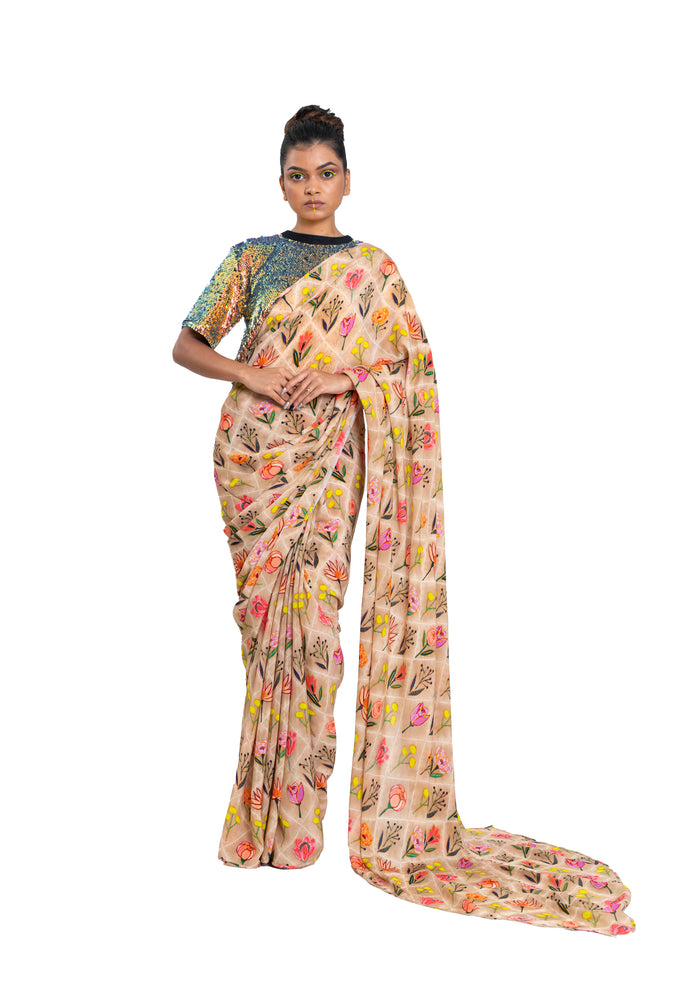 
                  
                    Checkered Floral Print Saree Styled With Holographic Sequin Blouse
                  
                